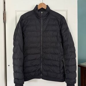 Black men's Timberland reversible puffer poly fill jacket size M